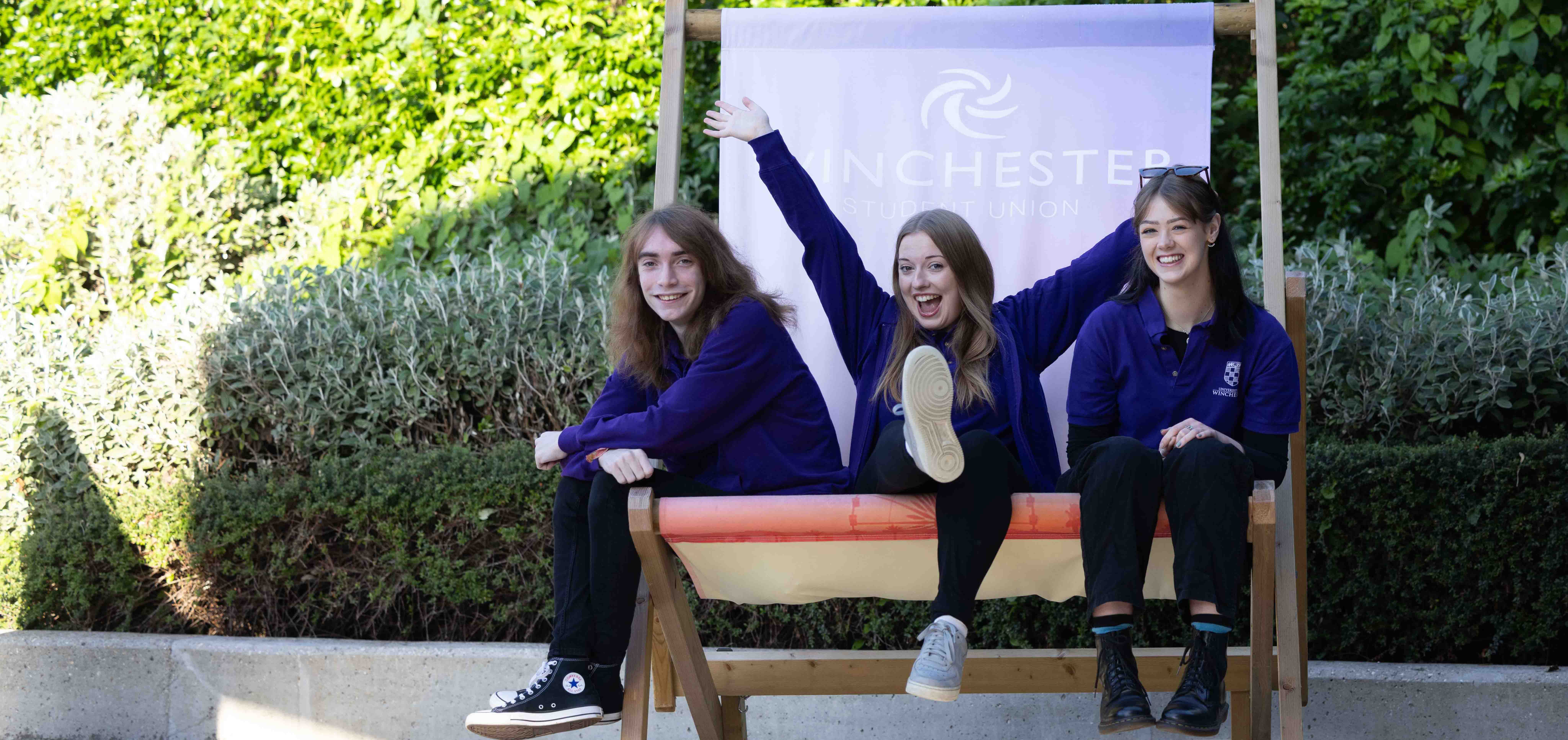 Students sat in giant deck chair