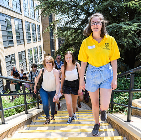 Student ambassador guiding guests around campus