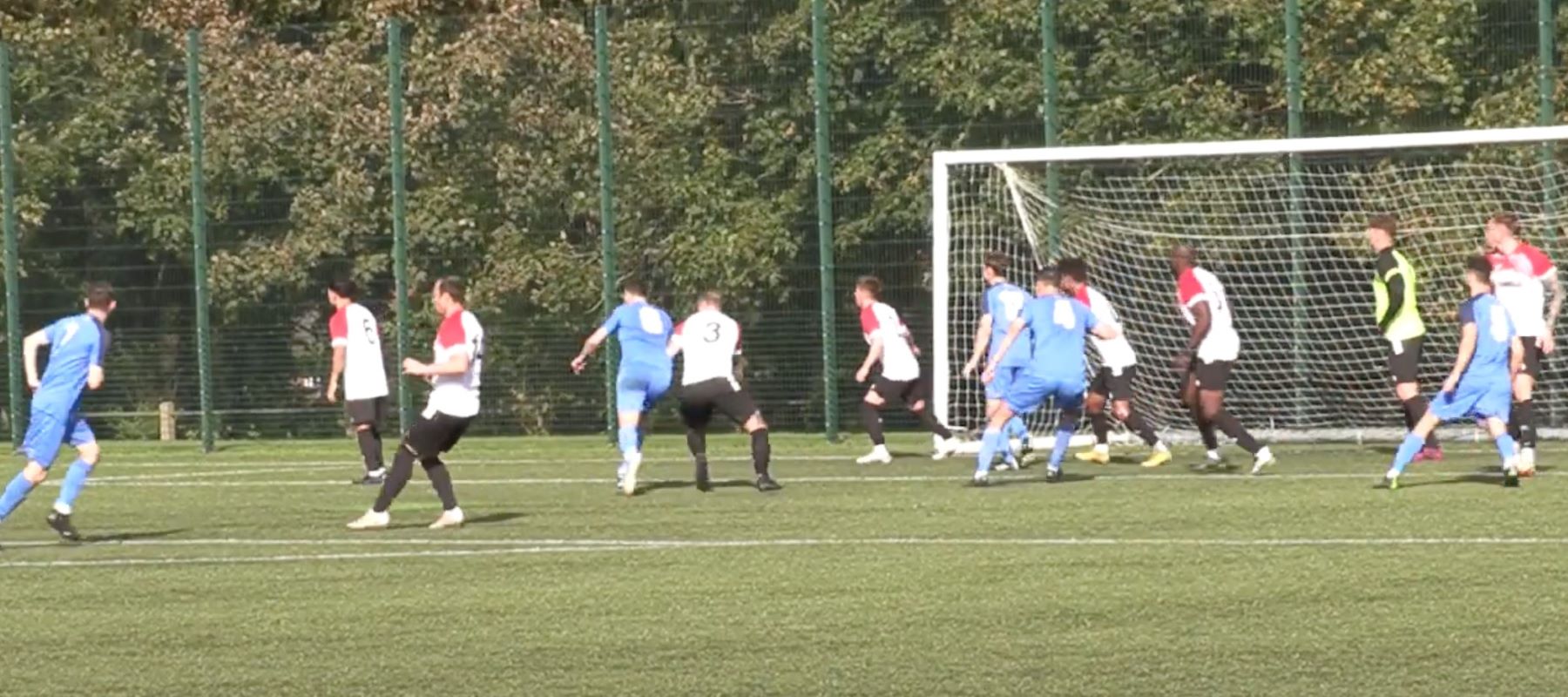 Scene from the goalmouth in football match