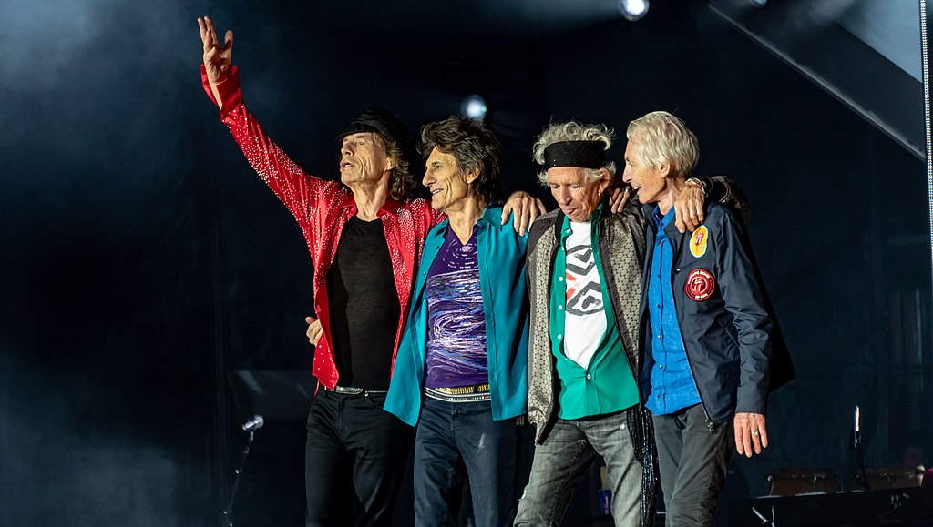 Four aged rockers on stage