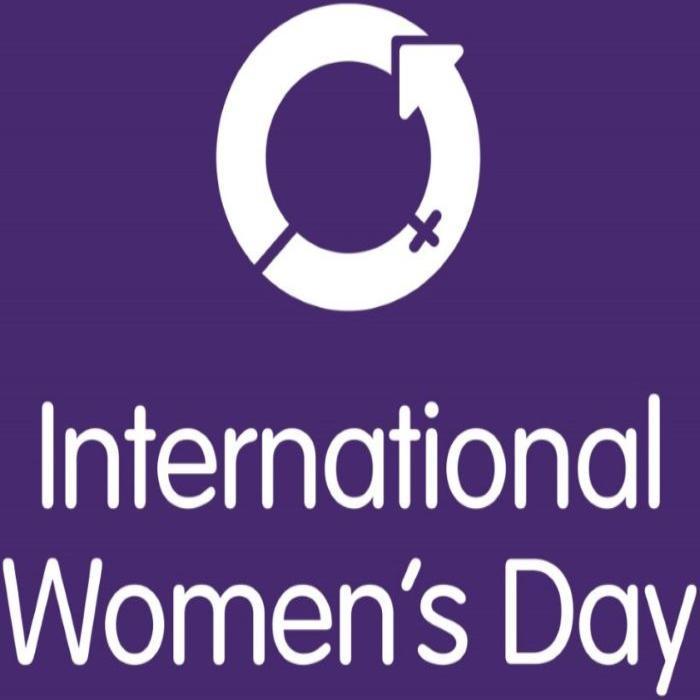 White circle logo and white letter International Women's Day on purple background