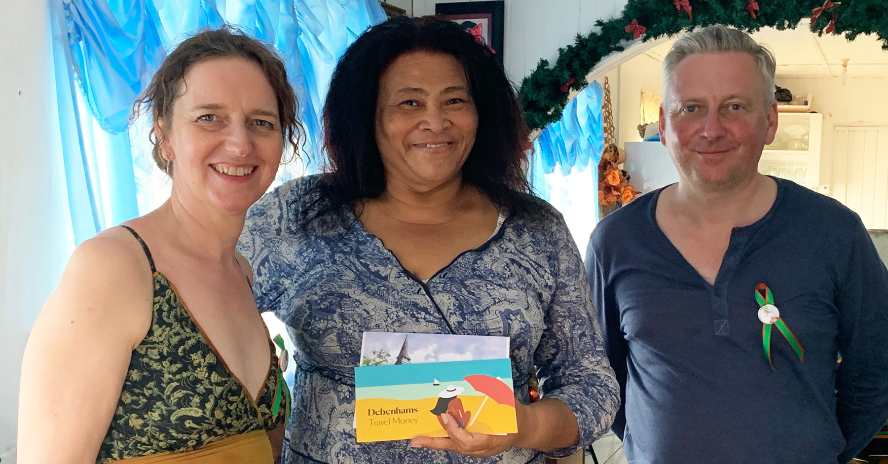 Community Heritage at Winchester: Dr Christina Welch and Dr Niall Finneran presenting Margaret Jackson, Head of Greiggs Village School in St Vincent, with a cheque in March 2020.