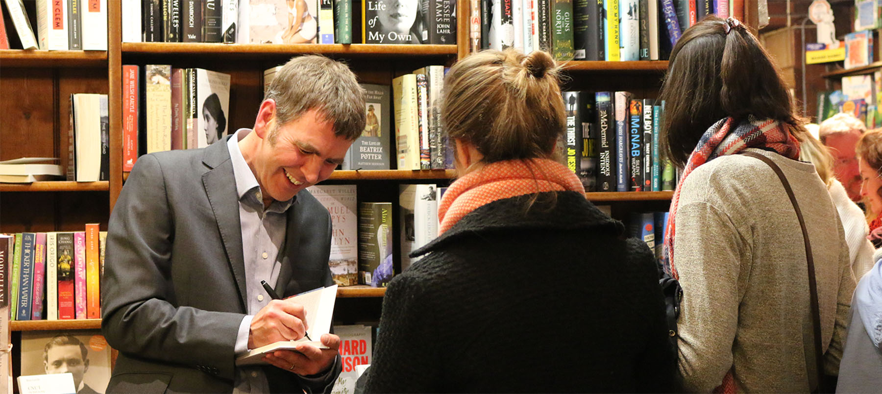 History research at Winchester: Dr Ryan Lavelle signing his book Cnut, the North Sea King