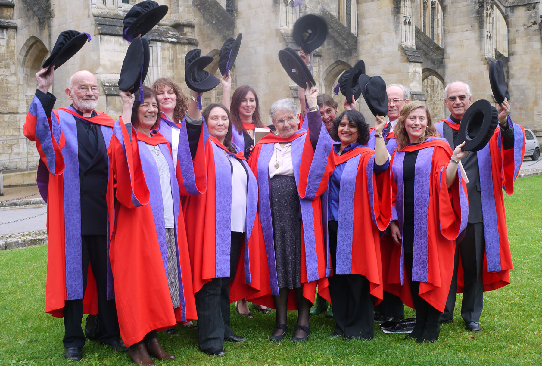 Research degrees at Winchester: celebrating PhD graduates outside Winchester Cathedral