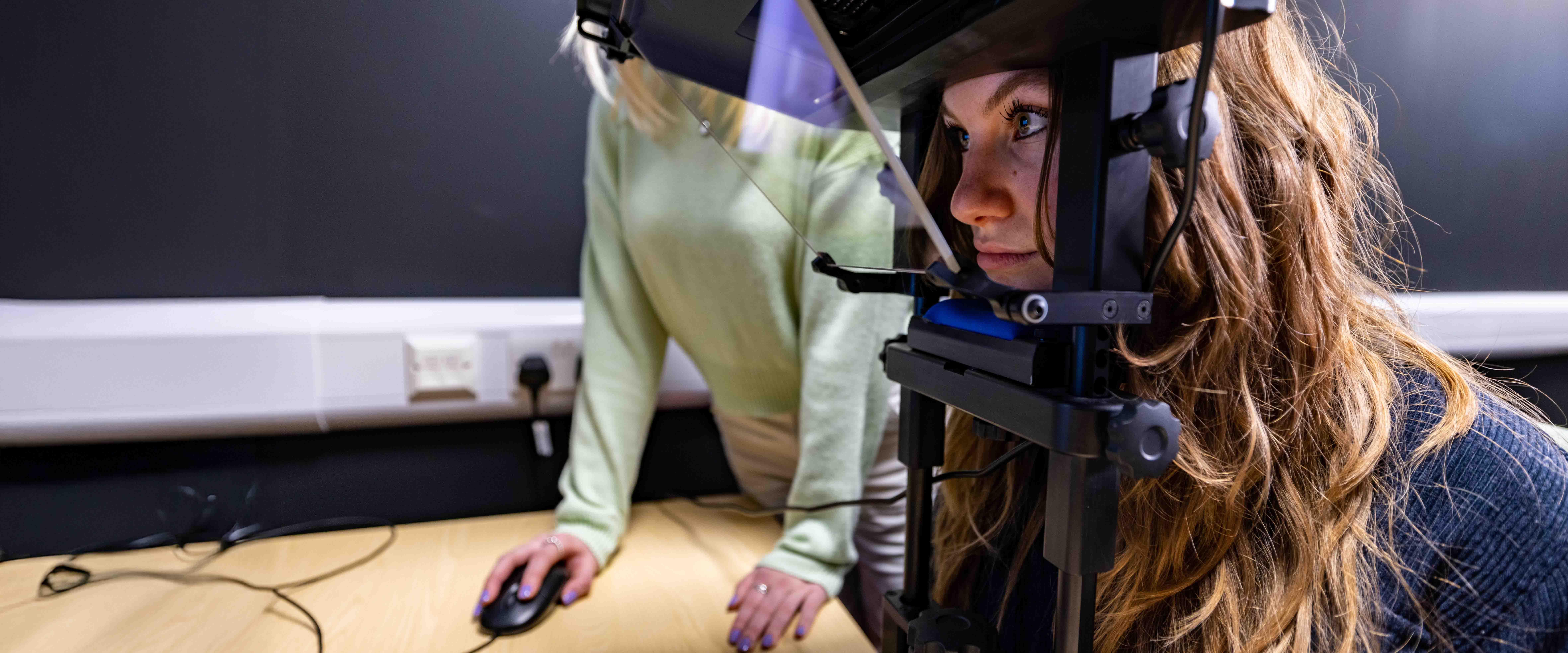 Psychology student using eye tracker