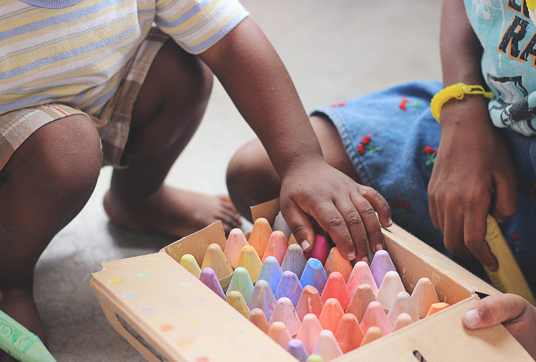 Children playing with chalk