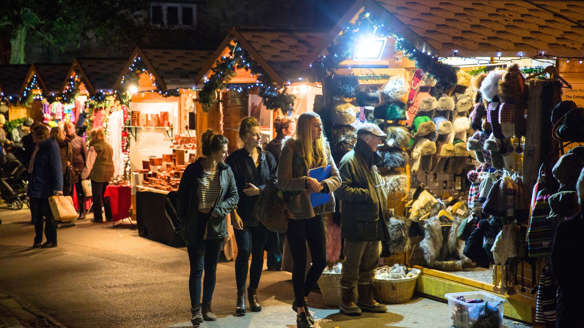 Christmas market visitors looking at stalls