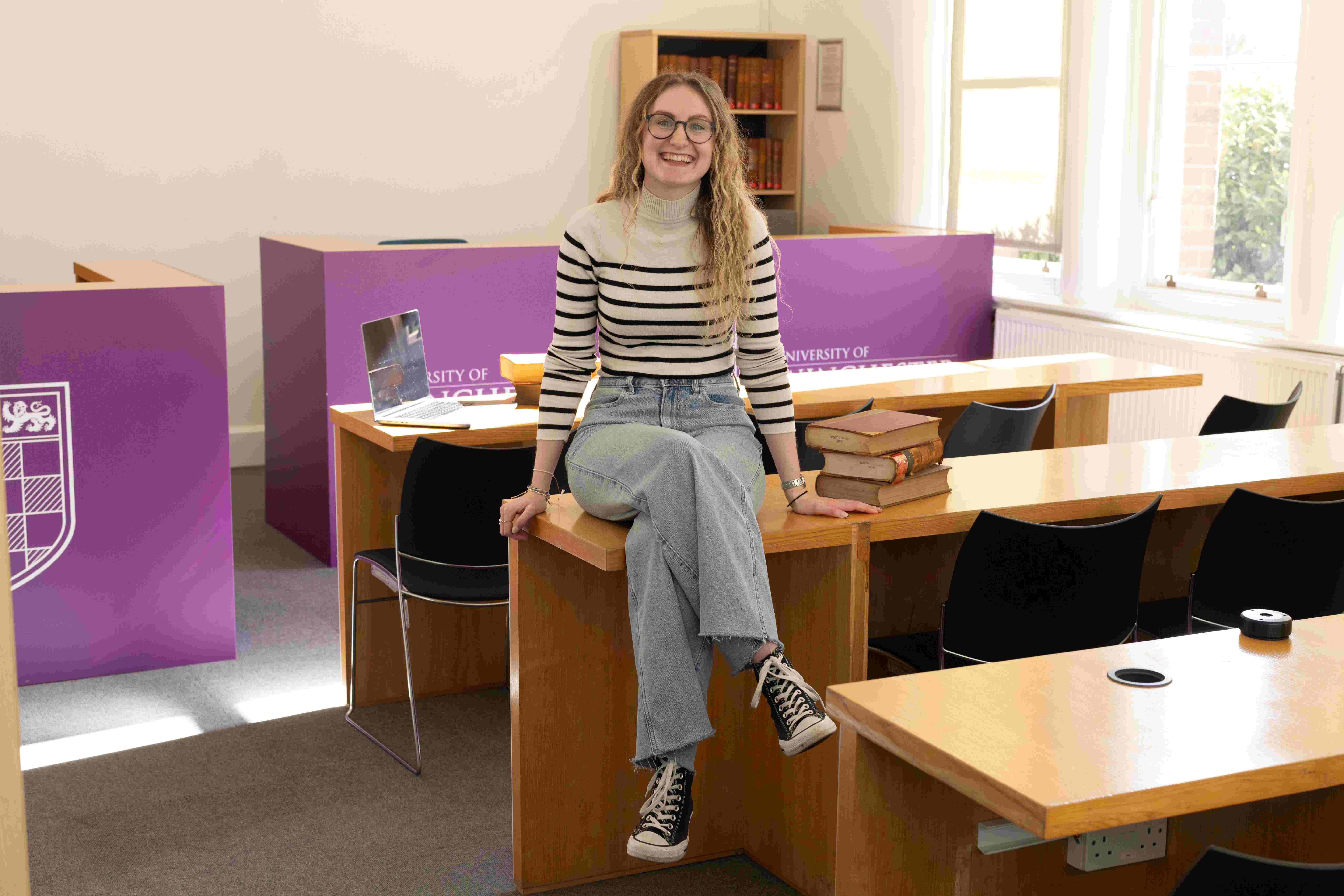 Law student in mock courtroom