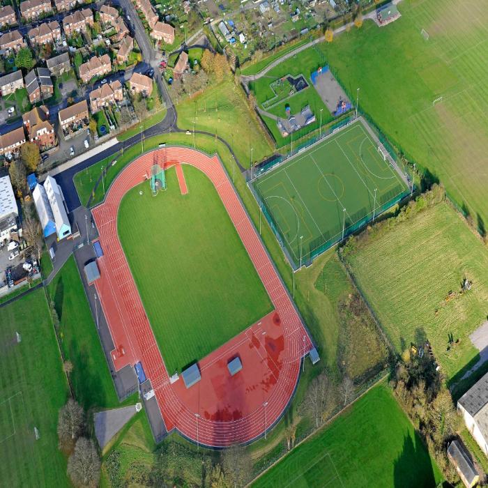 Bar end stadium with athletics track and football pitch
