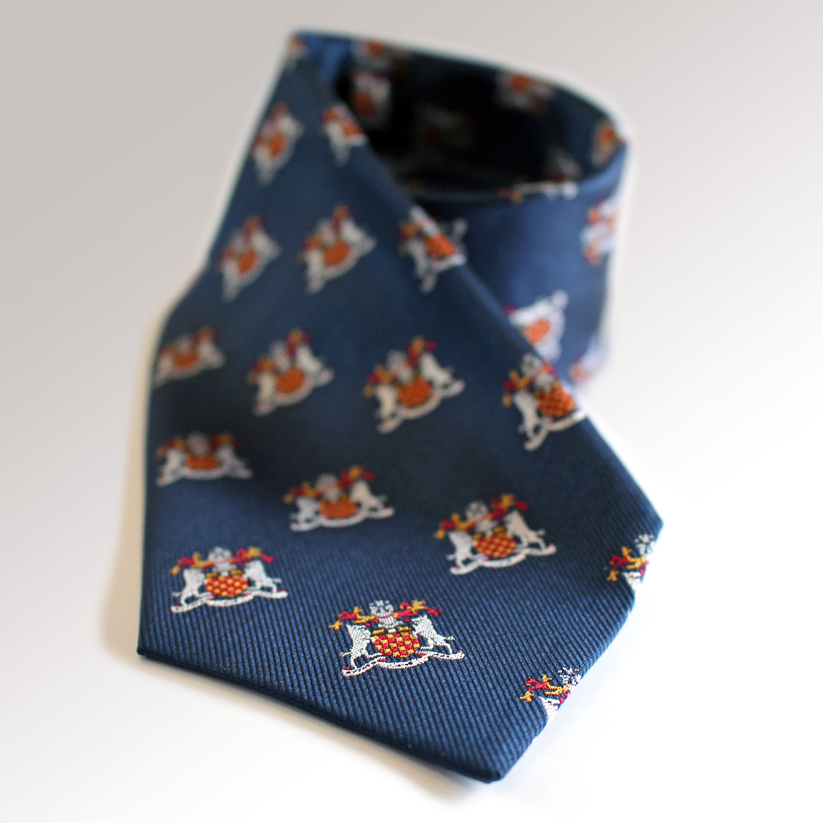 Tie with coat of arms on it