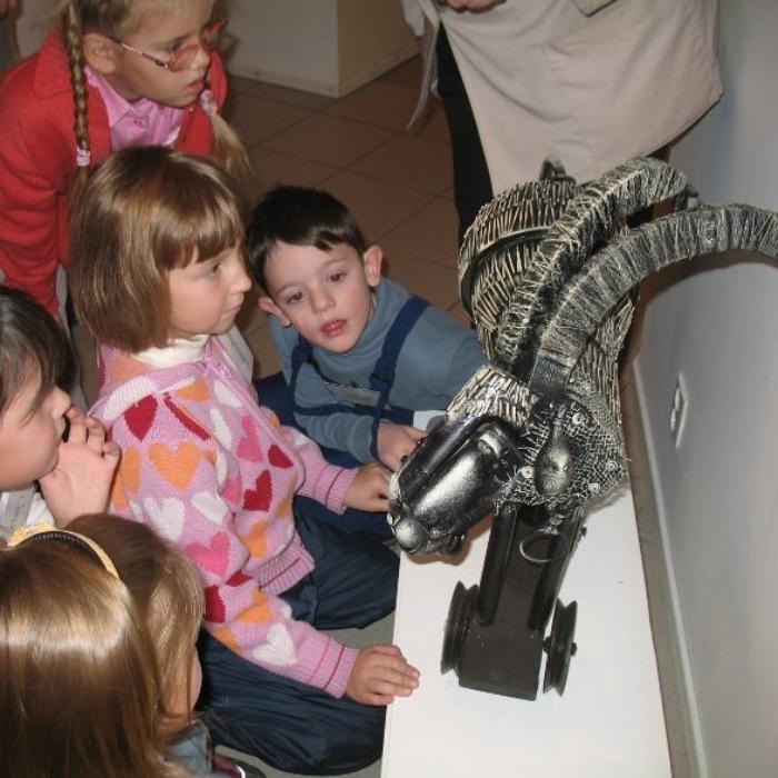 Young children looking at museum exhibit