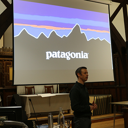 Man standing in front of presentation projection for Patagonia