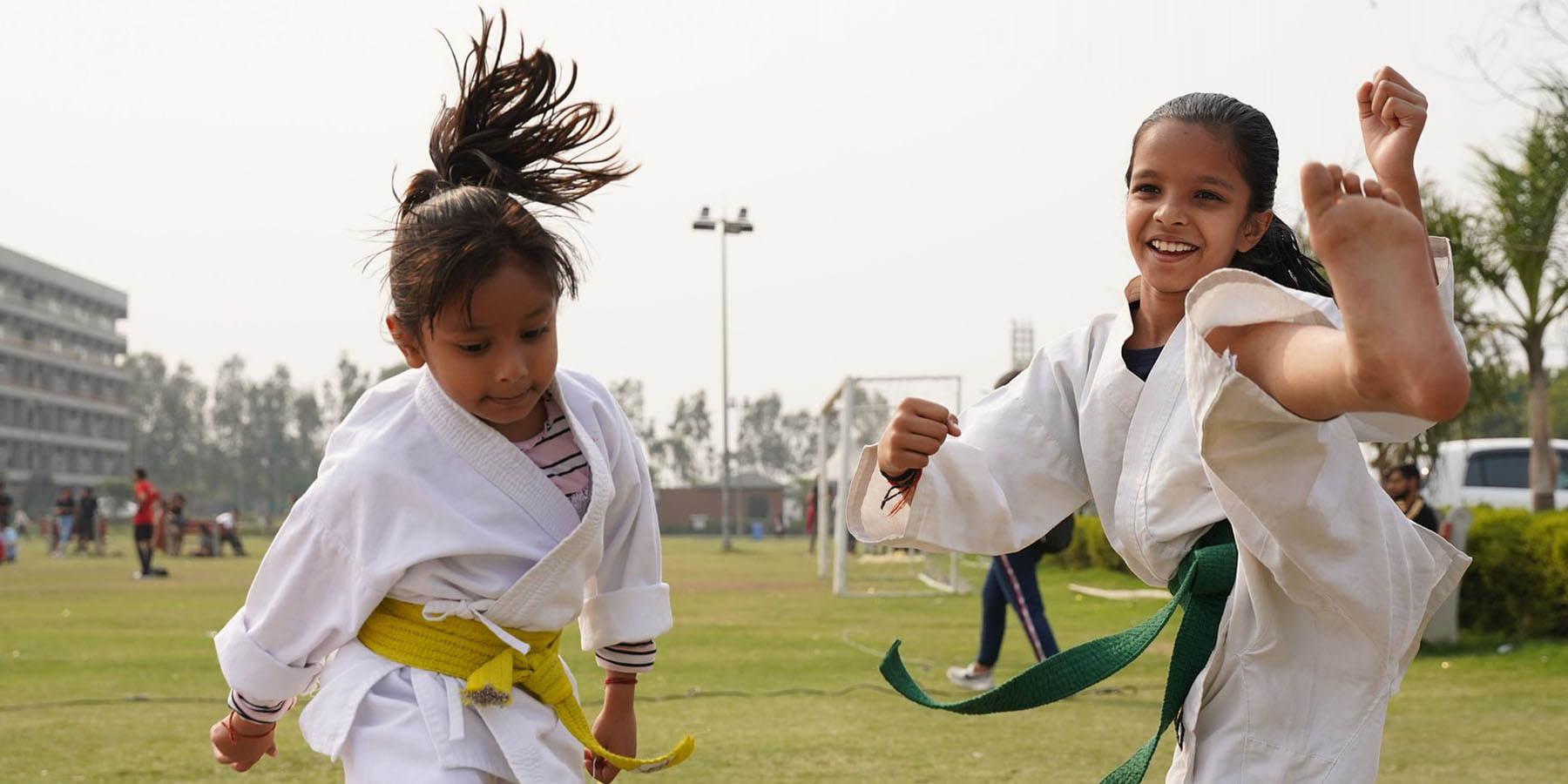 University of Winchester inclusivity in sport research: two young girls doing karate
