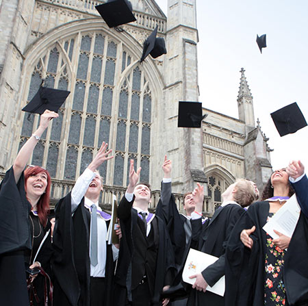 Student graduating outside Winchester Cathedral