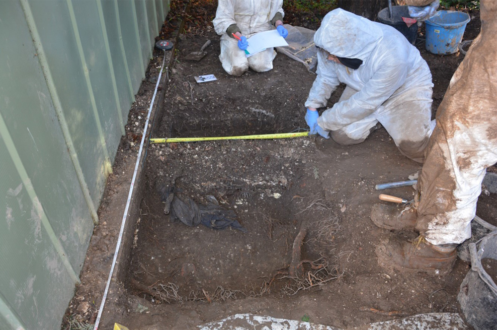 students digging as part of forensics course